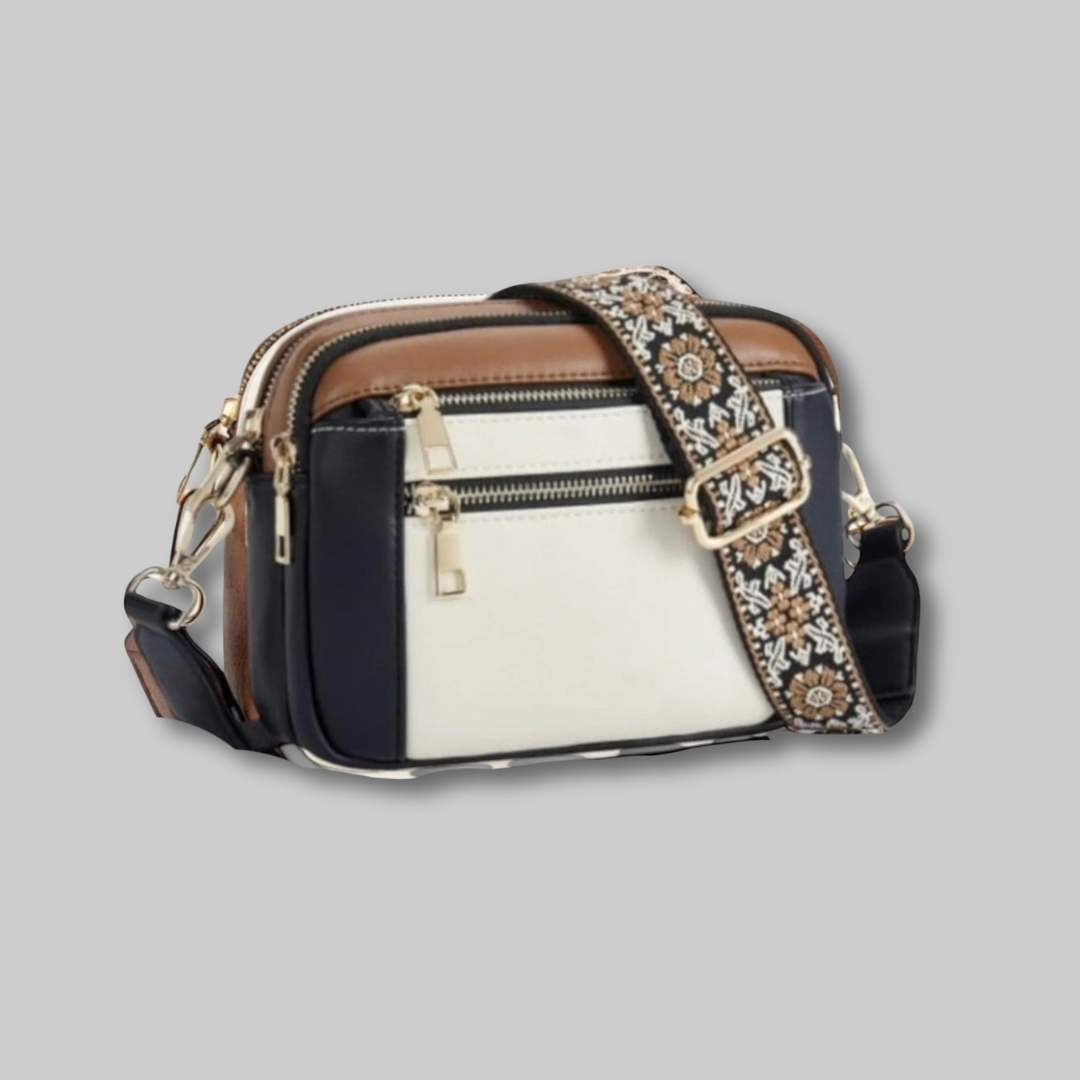 Mira -  Elegante bolso de cuero con asa