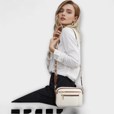Mira -  Elegante bolso de cuero con asa